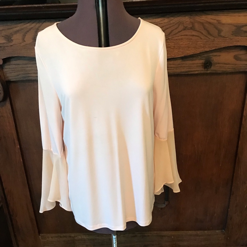 Calvin Klein pink bell-sleeved blouse.